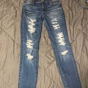 pacsun brand blue jeggings with rips size 24